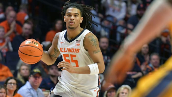 Illinois’s Skyy Clark dribbles
